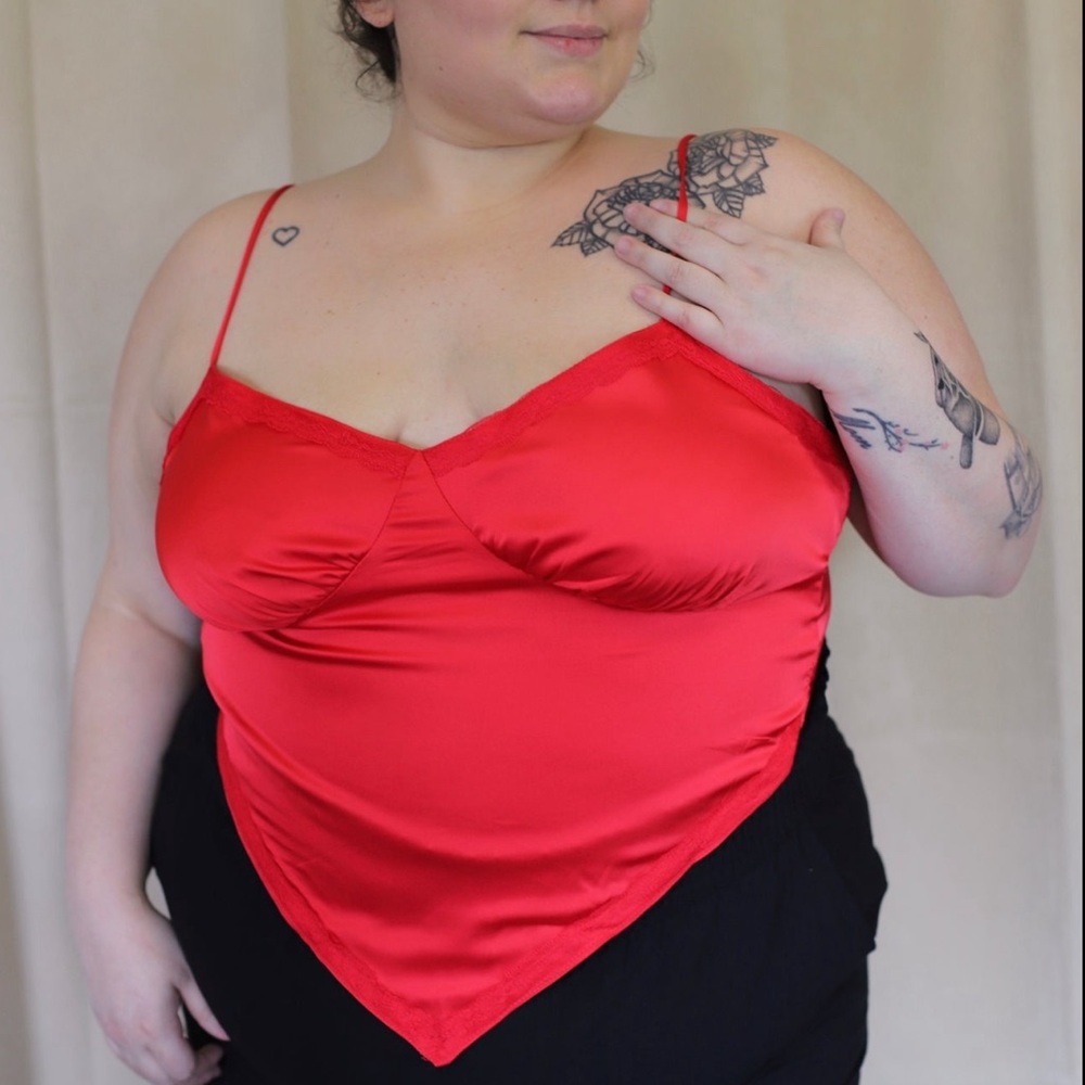 Tie back handkerchief crop top with adjustable straps.
